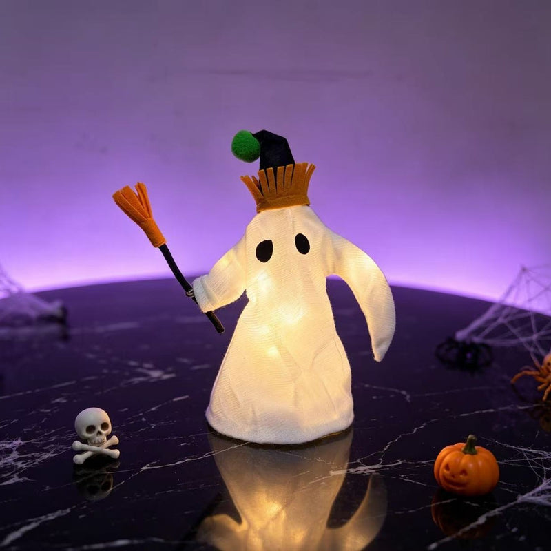 LED Light-Up Halloween Ghost Decor with Witch Hat & Broomstick - 11" Long Spooky Tabletop Decor, Haunted House Accent, Party Centerpiece