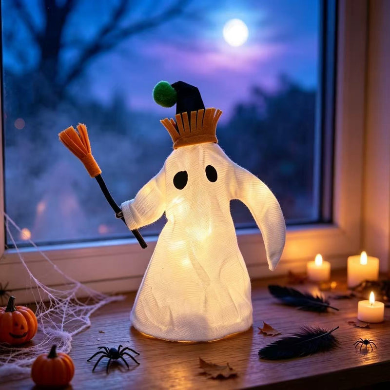 LED Light-Up Halloween Ghost Decor with Witch Hat & Broomstick - 11" Long Spooky Tabletop Decor, Haunted House Accent, Party Centerpiece