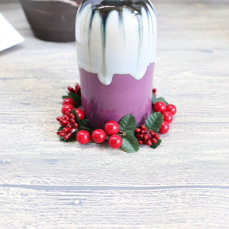 Corona de candelabro de mesa de frutas rojas de Navidad