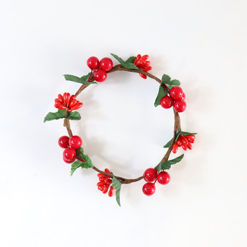 Corona de candelabro de mesa de frutas rojas de Navidad