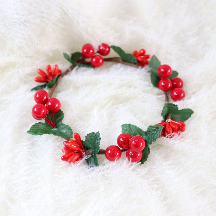 Corona de candelabro de mesa de frutas rojas de Navidad