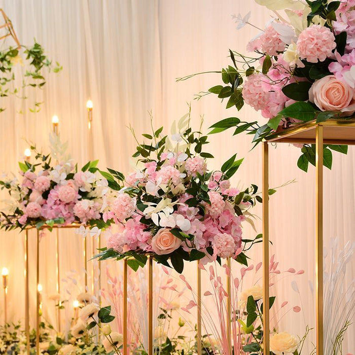 Arreglos florales hechos a mano con guirnaldas de rosas para centros de mesa de bodas 