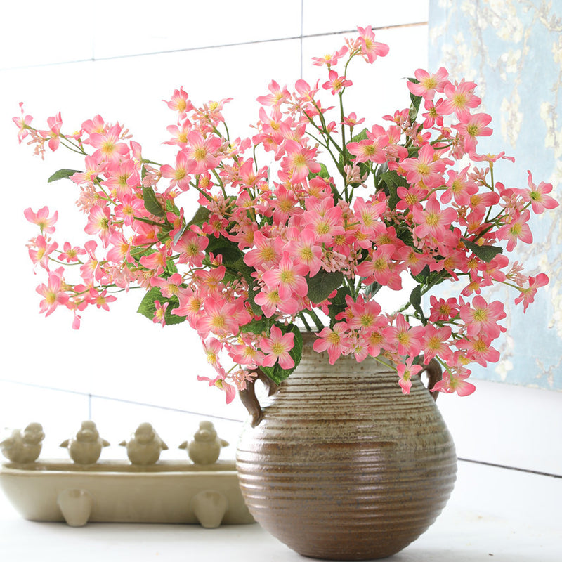 Branches de fleurs de Vernicia Fordii en vrac avec feuilles, plante artificielle en gros