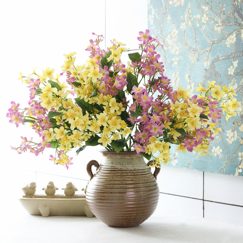 Branches de fleurs de Vernicia Fordii en vrac avec feuilles, plante artificielle en gros