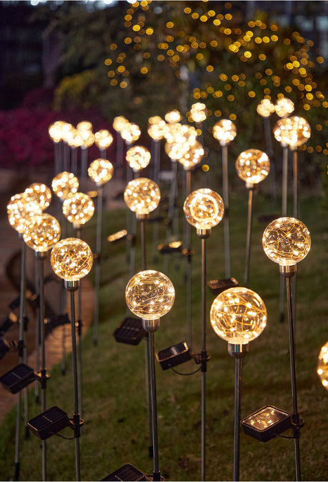 Venta al por mayor de la decoración del jardín de la lámpara insertada de la energía solar LED de la bola redonda a granel 