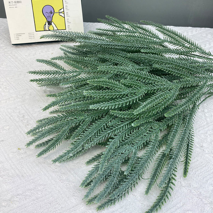 Venta al por mayor Artificial Flocked Pine Twig Greenery Plant Stem 27 pulgadas 